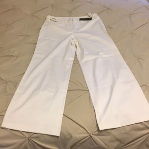 White pants with silver hardware detail